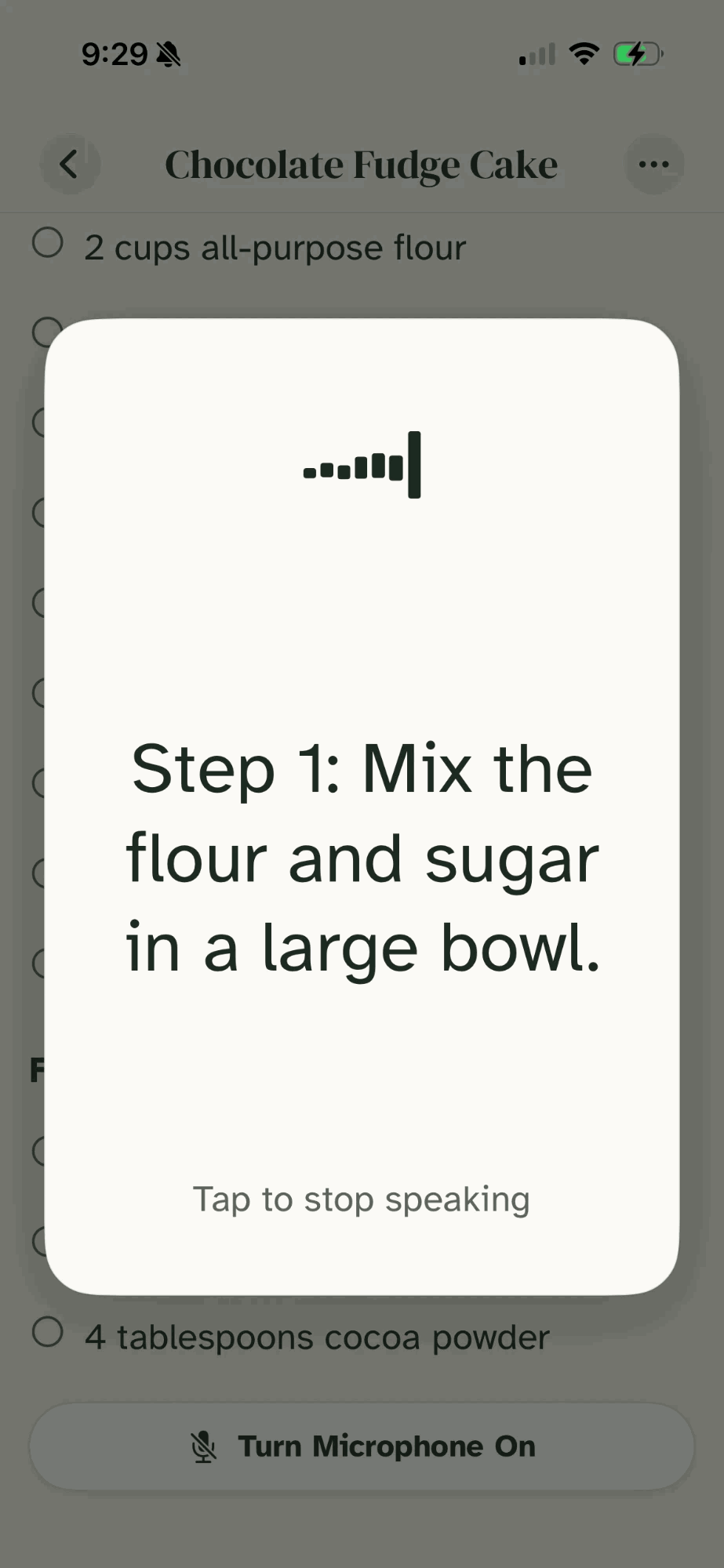 Cookie reading Step 1 aloud: Mix the flour and sugar in a large bowl. A Tap to stop speaking hint sits below.